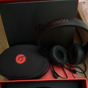 Beats by Dre head phones withBlack and Red Carry Case charger and book in box
